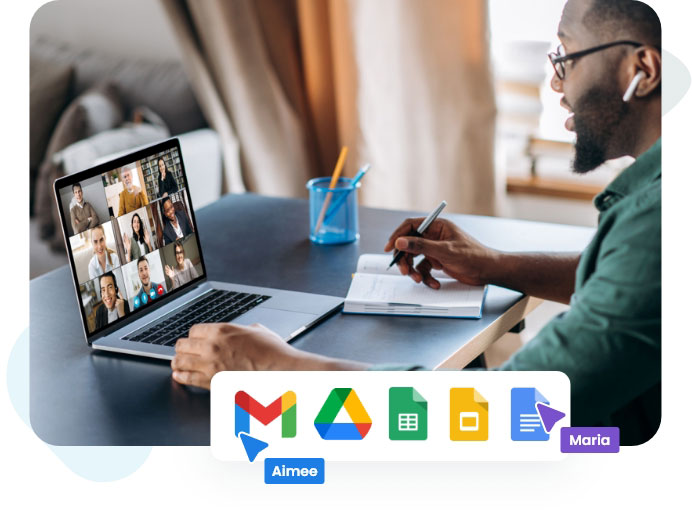 A man focused on his laptop, with a Google Calendar icon visible on the screen.