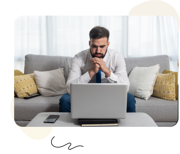 Business guy in front of laptop